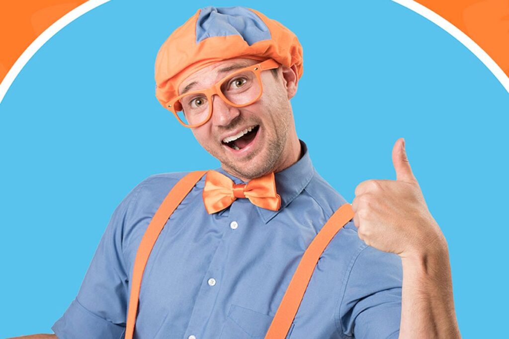 Blippi in his iconic orange and blue outfit