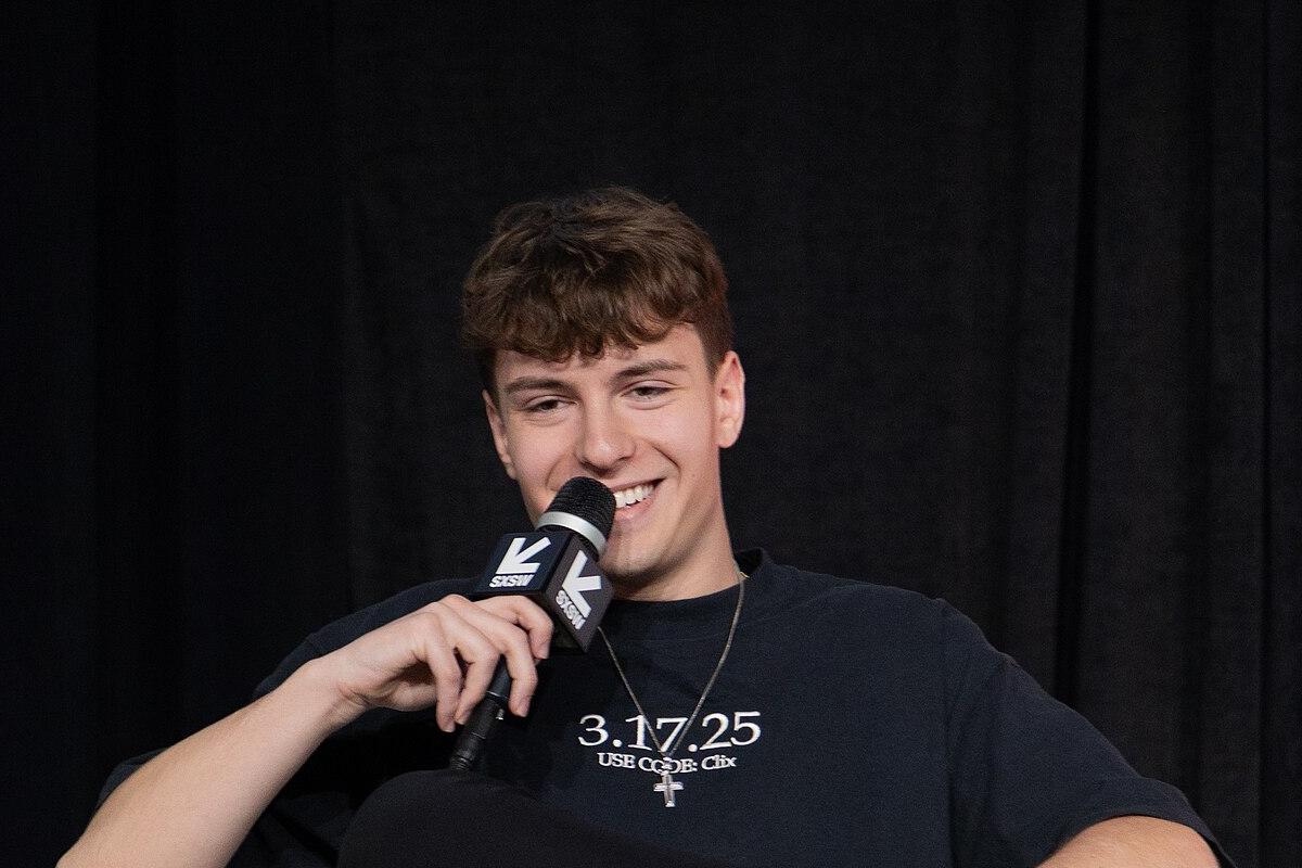 Clix speaking on stage at SXSW 2025